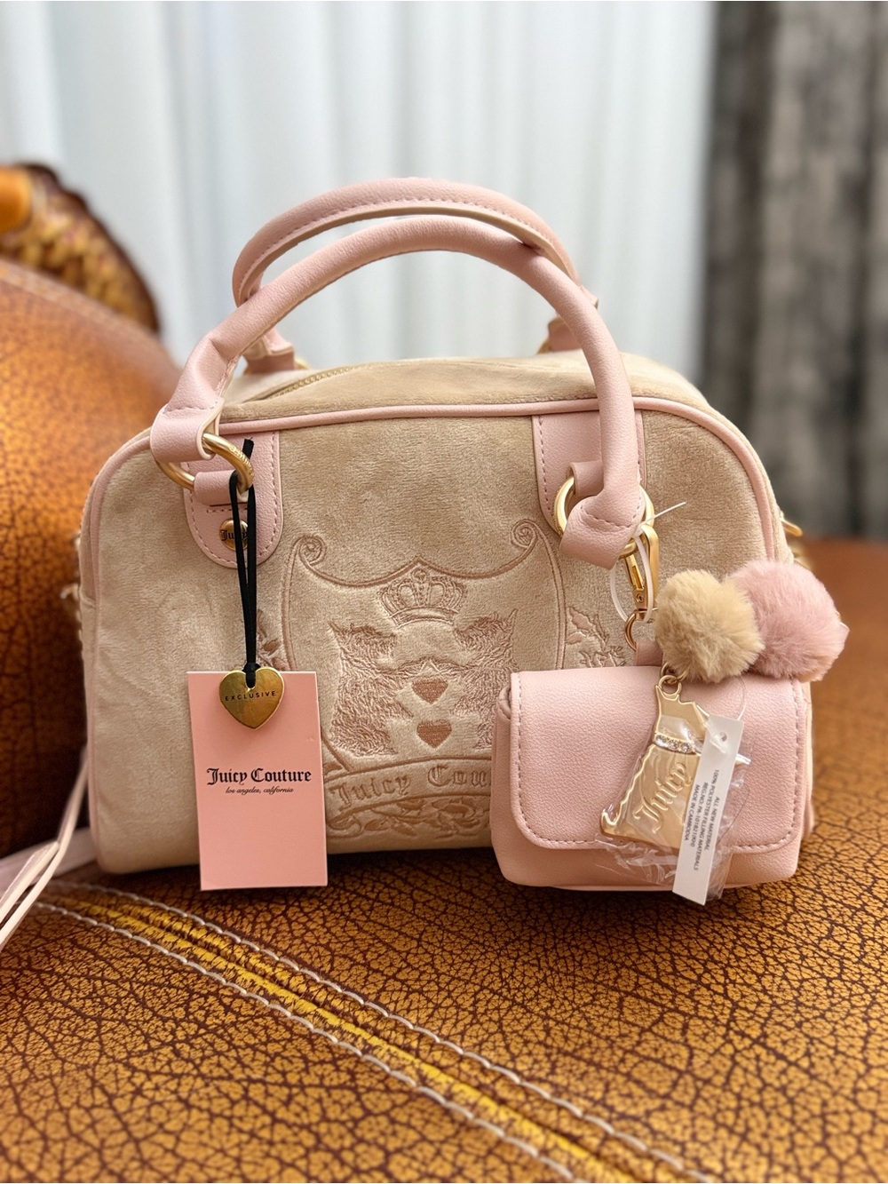 Juicy Couture Blush Pink Suede and Leather Satchel with Pom-Pom Charm